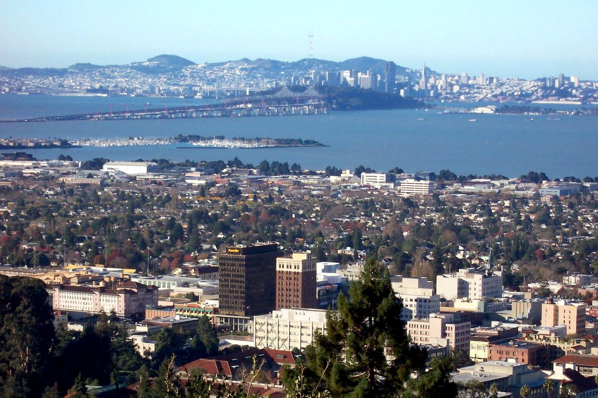 Downtown Berkeley's towers seen from the hills, with the bay, the Bay Bridge and the San Francisco skyline in the distance