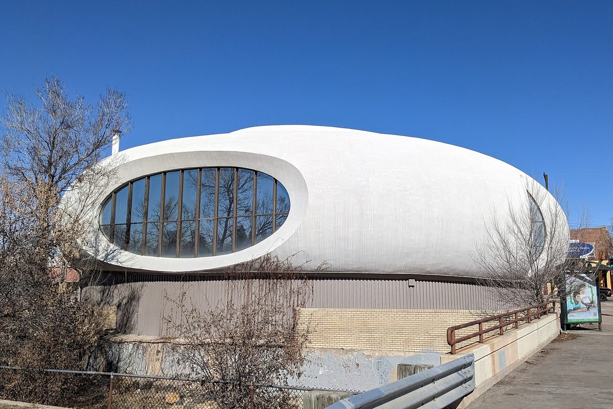 The white, rounded former Key Savings and Loan building on South Broadway in Englewood, known as the Flying Saucer Bank, with one long oval window