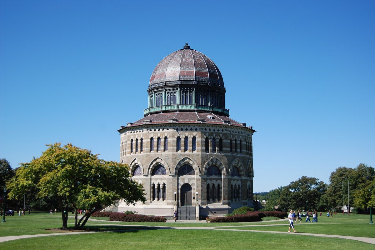 The round, domed stone Nott Memorial on the Union College lawn in Schenectady under a clear blue sky